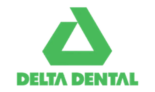 The image displays a logo consisting of a green triangle with a white outline, inside which there s a stylized letter  D  with a tooth-like shape on its right side, all set against a white background.